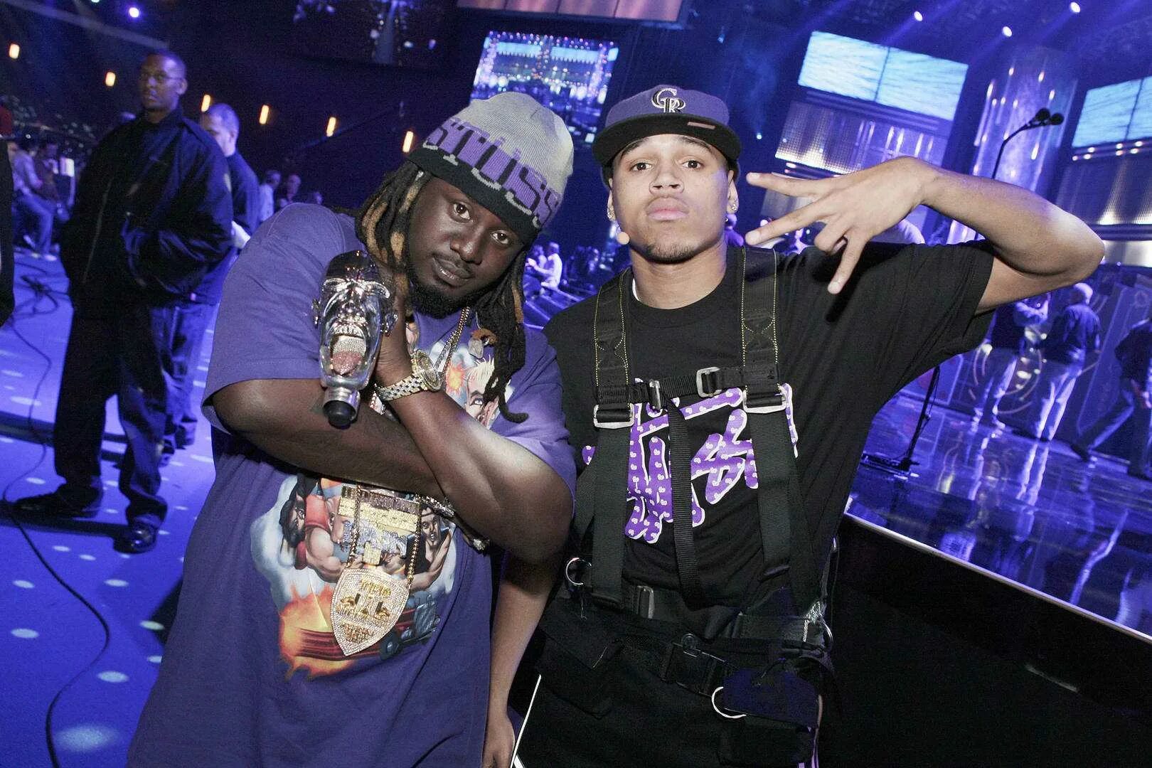 No one else chris brown. T-pain. kiss kiss t-pain. chris brown posing.