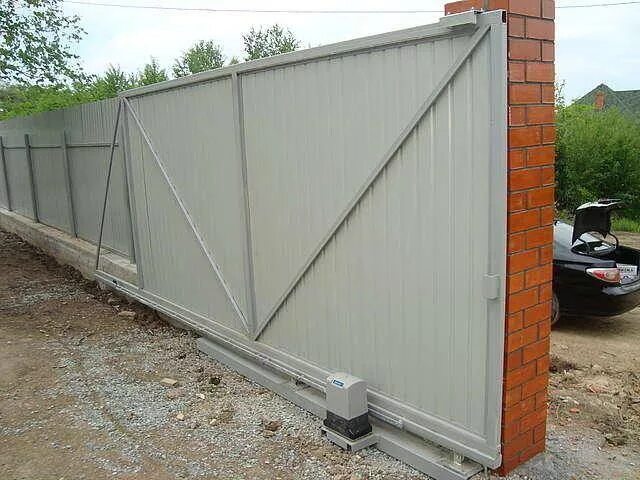 Ворота откатные раменский. Ворота откатные раменский. Раздвижные ворота из профнастила. Откатные ворота профлист 3011. Откатные ворота из профиля 60х60.