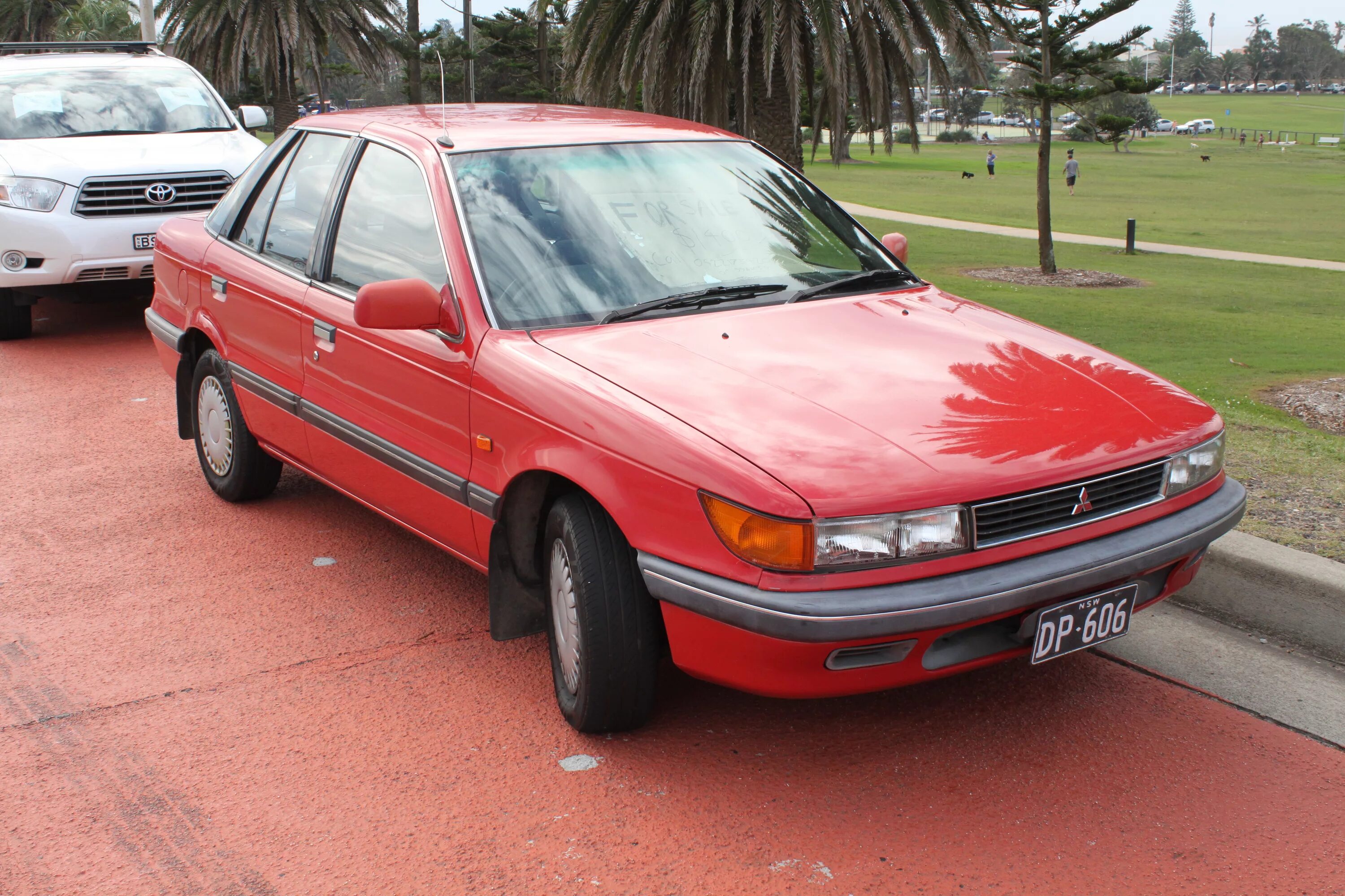 Митсубиси 1990. Митсубиси Лансер 1990. Mitsubishi Lancer 1991-1992. Мицубиси ланцер 1990. Mitsubishi Lancer 1992.