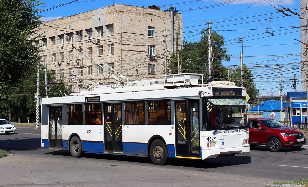 В каком городе выпускают троллейбусы. Тролза 5275.03. Троллейбус Тролза Оптима с гармошкой. Троллейбус Оптима 5275.03. Тролза-5275 «Оптима».