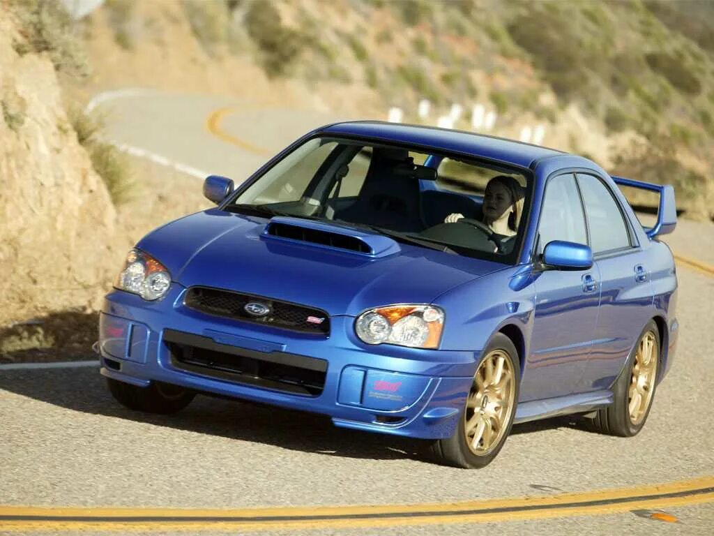 Субару какие модели. Subaru Impreza WRX STI 2005. Subaru WRX STI 2005. Subaru Impreza 2005. Subaru Impreza WRX 2003.