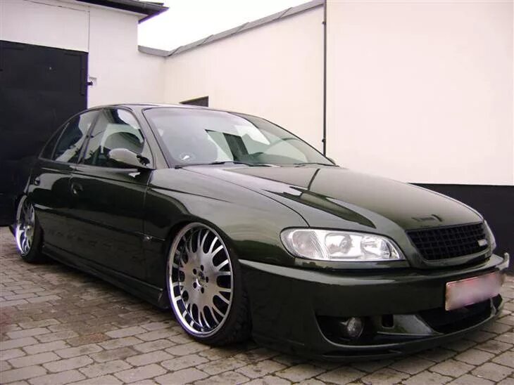 Омега б рестайлинг купить. Opel Omega b обвес. Opel Omega в обвесе. Опель Омега б 1997 Tuning. Opel Omega b Tuning.