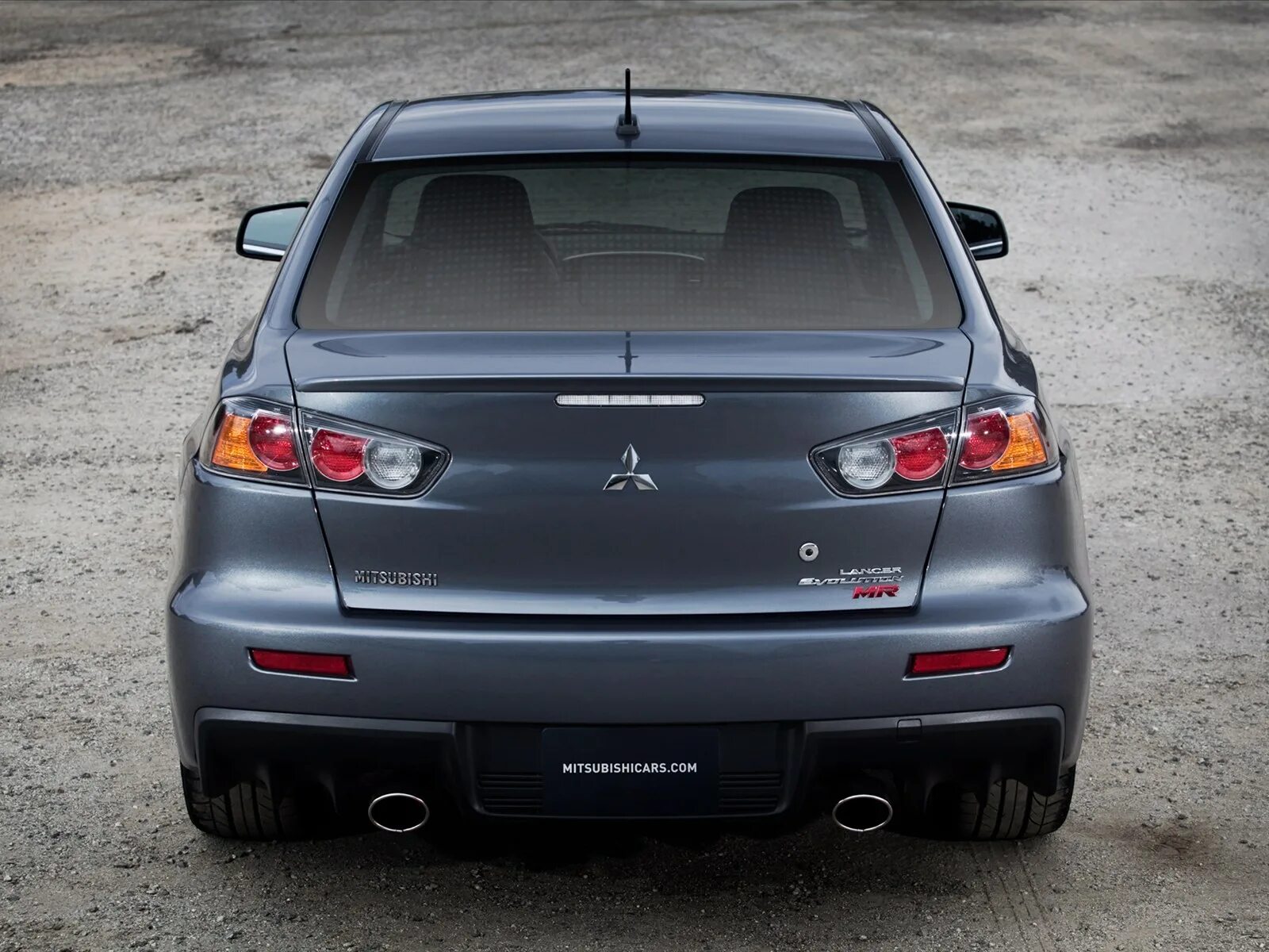 Фото машина задний. Lancer 10 Evolution сзади. Mitsubishi Lancer Evolution 10 сзади. Mitsubishi Lancer EVO 10 сзади. Митсубиси Лансер 10 сзади.