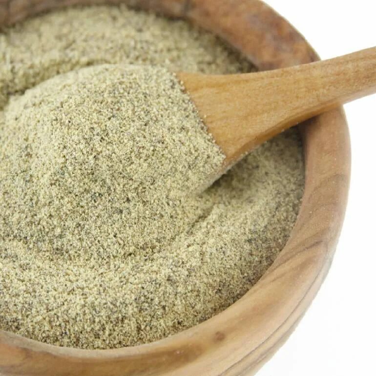 White pepper. Pepper powder. spoon pepper powder. черный перец порошок в прозрачной посуде.