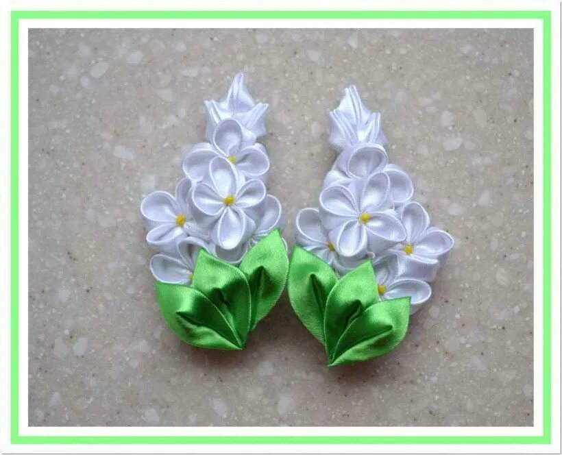 Цветок в технике канзаши. Канзаши. Канзаши поделки. Поделки из атласных лент. Цветы канзаши.