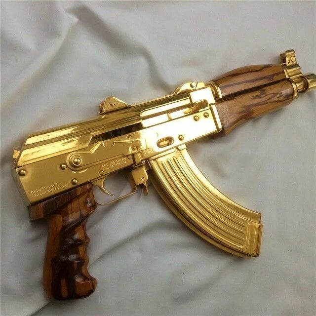 Gold ak. Ак 47 золотой калаш. Золотая арабеска ак 47 кс го. Золотой ак 47 схп. Автомат на прозрачном фоне.