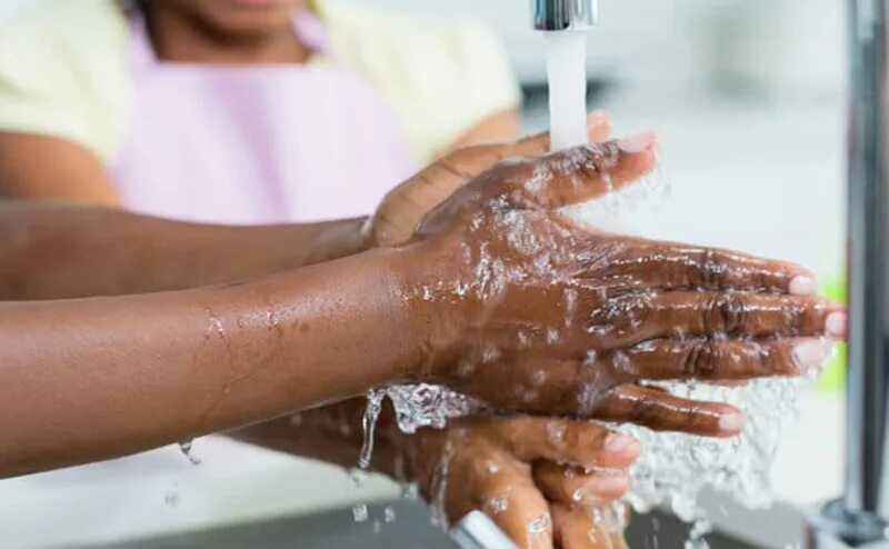 We wash hands. Мыть руки. Мытье рук фото. Подросток умывается. Мытье рук арт черный.