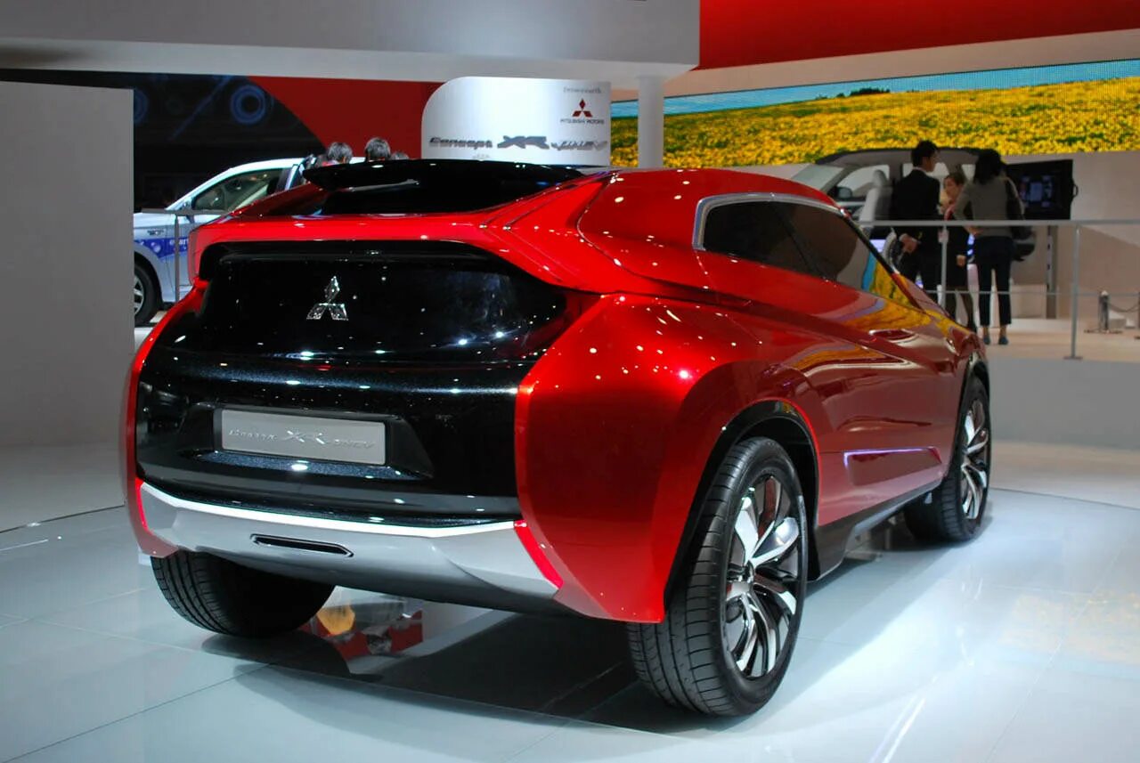 Mitsubishi новый год. Mitsubishi Concept XR-PHEV. Митсубиси кроссовер 2022. Новый Мицубиси АСХ 2022. Новые модели Митсубиси в 2022.