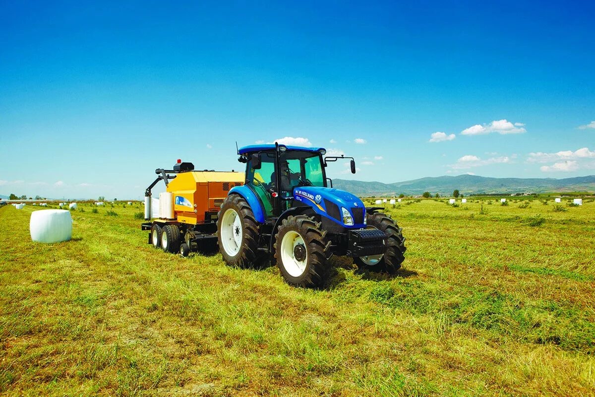 Трактор поле картинки. New Holland td5.110. Трактор New Holland td5.110. New Holland td5.90. Td 5 100 New Holland.