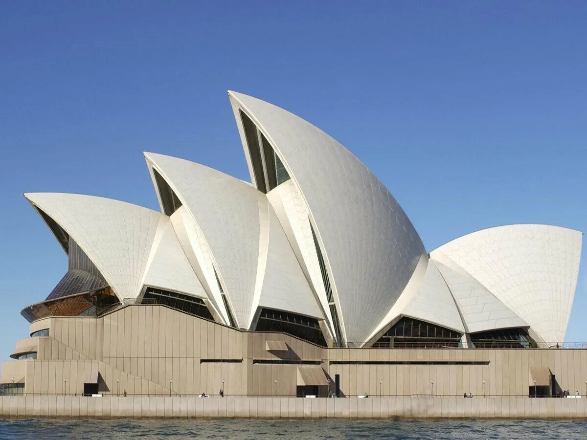 Какие есть известные здания. Сиднейский оперный театр Австралия Архитектор. Оперный театр в Сиднее Австралия. Оперный театр Сидней архитектура. Здание оперного театра в г. Сидней (Австралия).