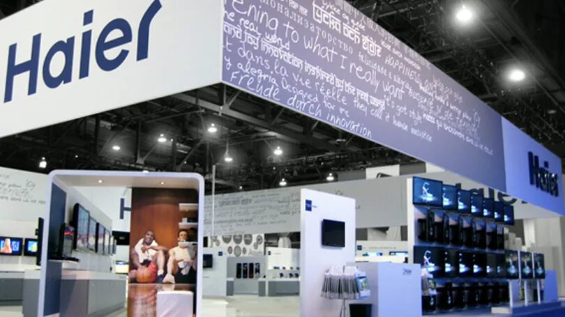 Хайер чья страна. Haier логотип. Хайер старый логотип. Haier Group Corporation. Фирменный магазин Haier.