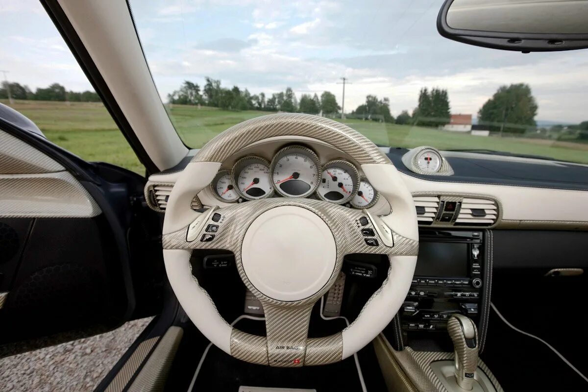 Салон автомобилей руль. Porsche 911 mansory. porsche 911 mansory interior. руль porsche 911 997. руль порше 911 каррера.