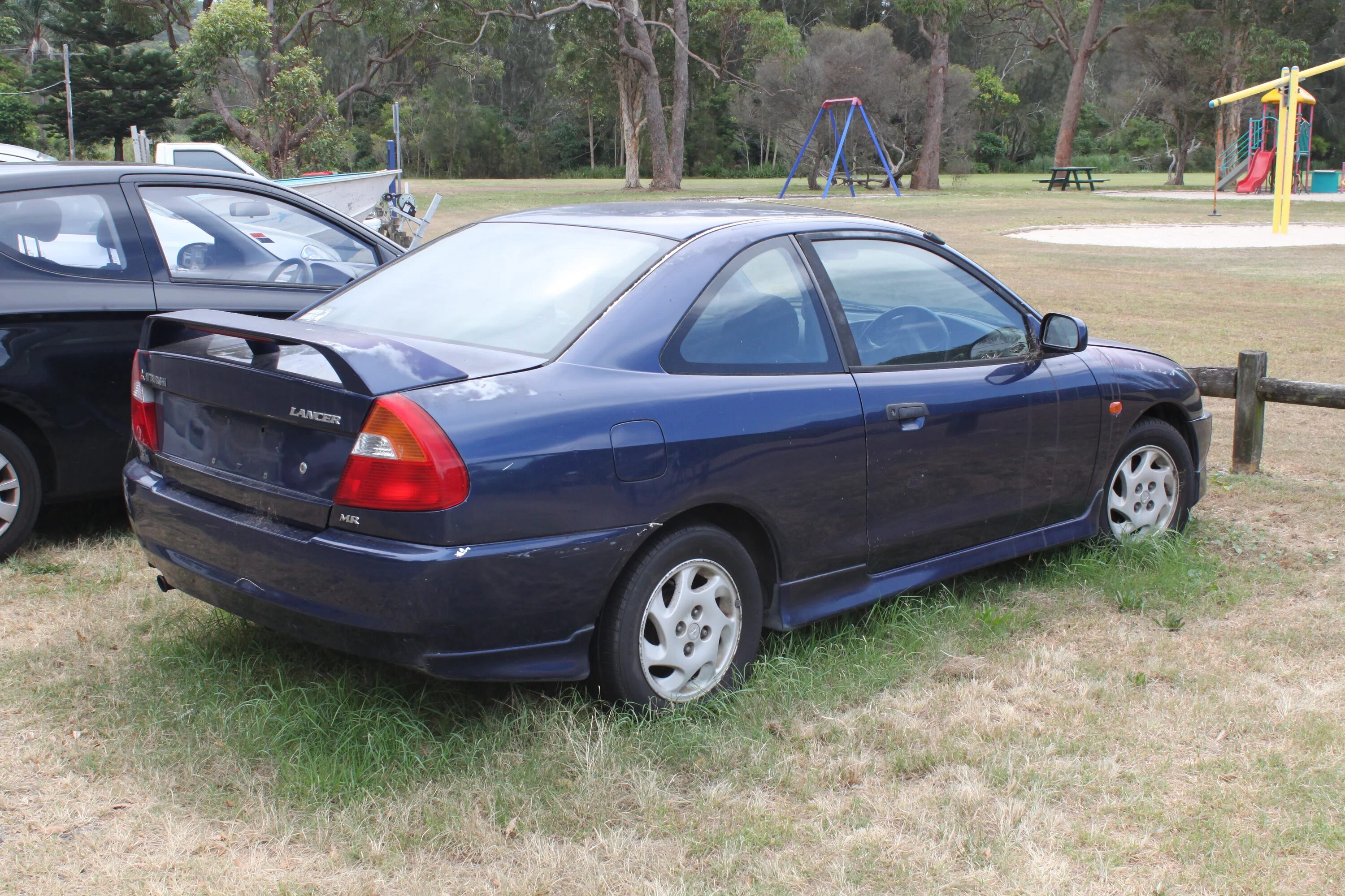 Мицубиси 1999г. Mitsubishi Lancer 1999. Митсубиси Лансер 1998г. Мицубиси ланцер 1999. Тойота ланцер 1998.