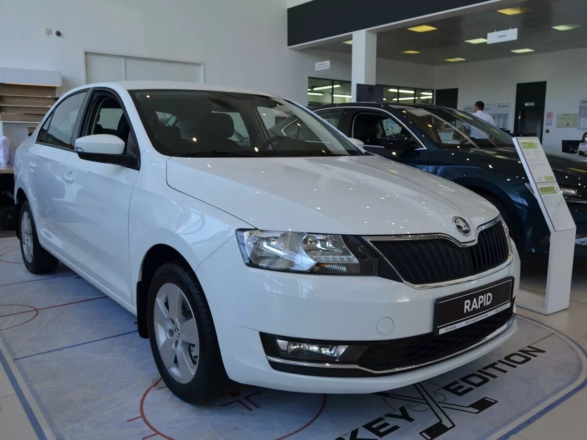 Шкода рапид 2015 купить. Шкода Рапид белая 2015. Skoda Rapid 1.6l. Шкода Рапид 1.6 90 л.с. Шкода Рапид 14 года.