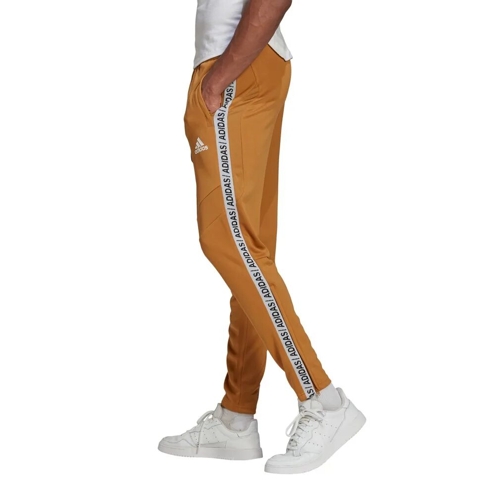 Tp long. Adidas брюки tiro track Pants. Штаны адидас коричневые.