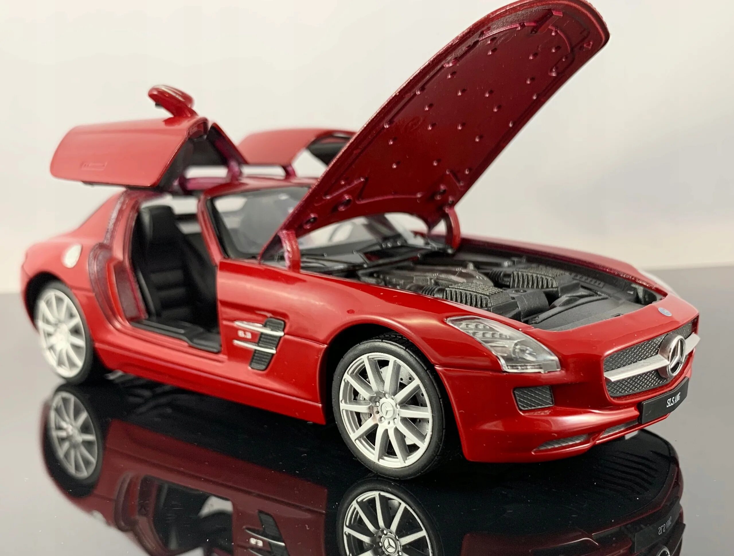 Модели больших машин. Welly Mercedes-Benz SLS AMG. Модель Mercedes Benz SLS AMG 1:24. Модель Форд Мустанг 1 43. Welly Мерседес 1:64.