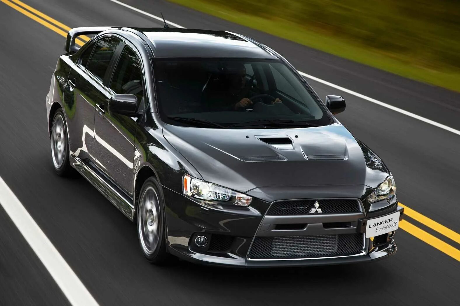 Mitsubishi lancer evolution x 2008. Эволюшн 10 характеристики. Мицубиси лансер 10 эволюшн. Mitsubishi evolution x 2008. Mitsubishi evolution 10.