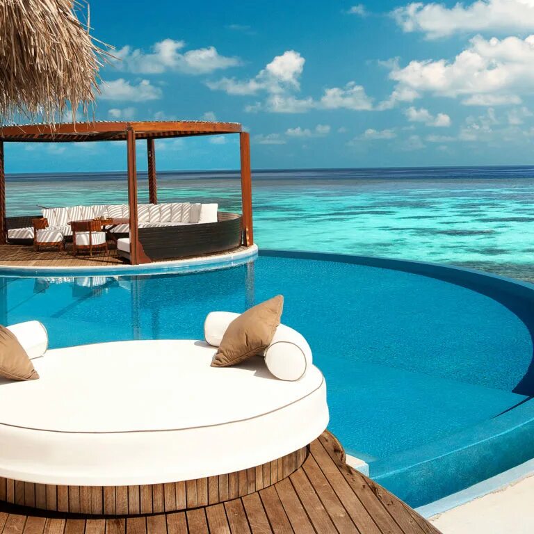Мальдивы. Мальдивы бассейн. Пляж с бассейном. Мальдивы отели.