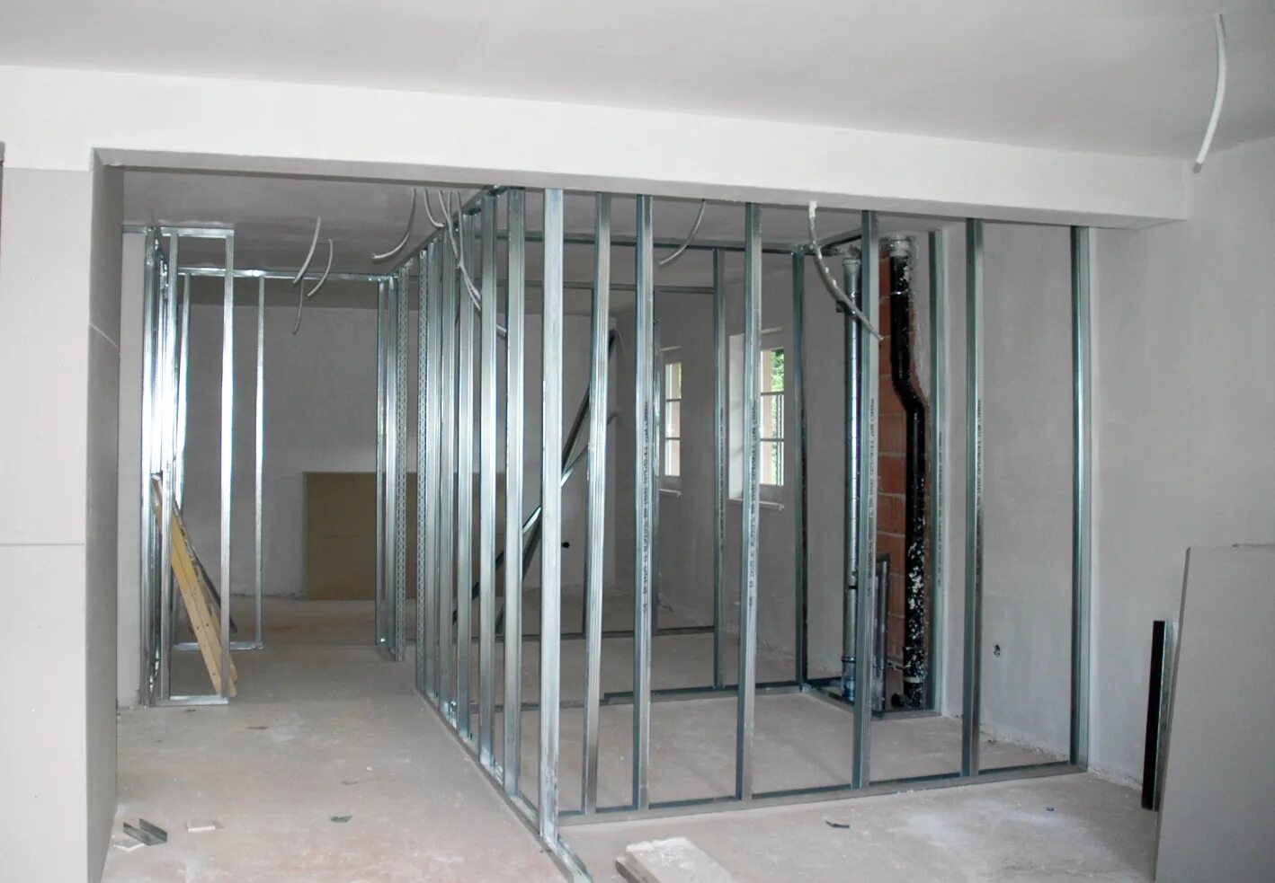 Монтаж гипсокартонного потолка. Перегородка из гипсокартона. Монтаж гкл. Монтаж гипсокартона на стену. Каркас кнауф для перегородок.