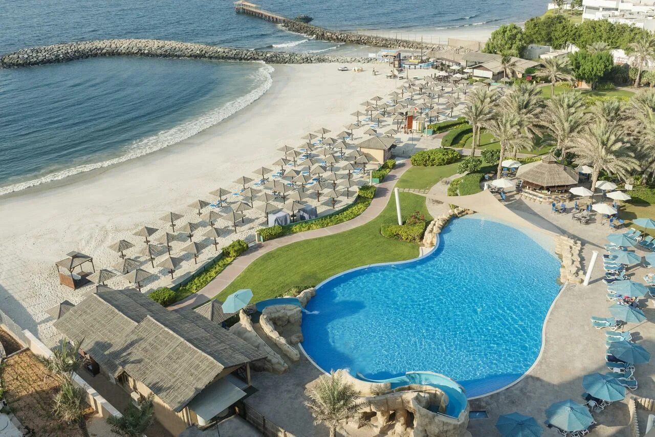 Отель coral beach. Коралл Бич Резорт Шарджа. Корал Бич Резорт ОАЭ Шарджа. Корал Бич Резорт Шарджа 4. Coral Beach Resort Sharjah 4 Шарджа.