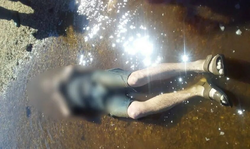 Найдено тело в реке парня.