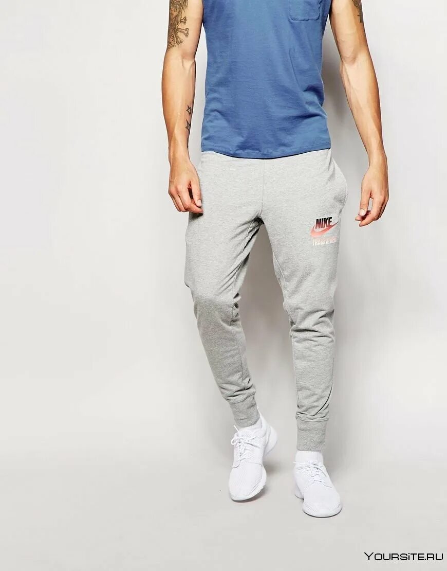 Спортивные штаны под. Спортивные штаны Ellesse зауженные. Спортивные штаны мужские зауженные. Спортивные штаны мужские 2022. Спортивные штаны мужские зауженные к низу.