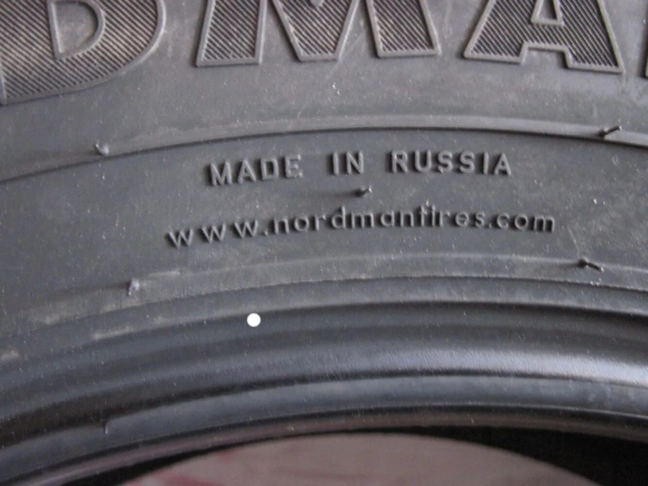 Где на шинах год выпуска фото. Nokian Tyres Nordman rs2 185/65 r15 92r. Маркировка на шинах Нордман 5. Дата изготовления шины Nokian Нордман 7. Дата выпуска на шинах Нокиан.