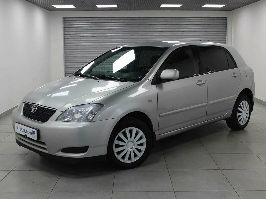 Toyota corolla e120 2005. Тойота королла 120 рестайлинг. Тойота королла 2006 e120. Тойота королла 120 бежевая. Тойота е120 рестайлинг.