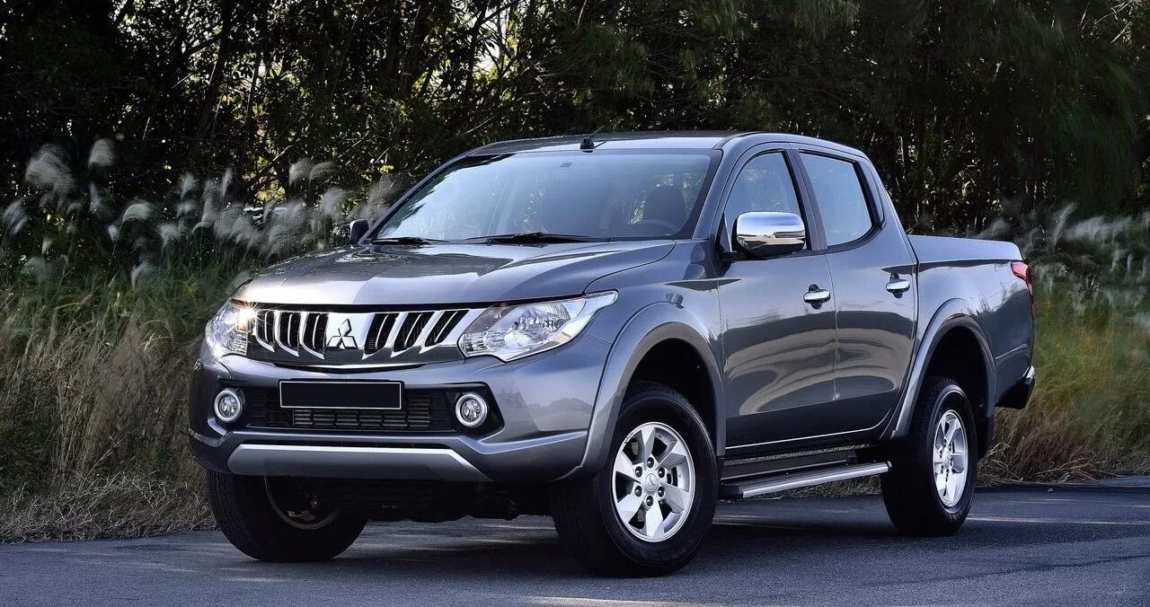 Новый мицубиси л200. Mitsubishi l200. Джип Митсубиси l200. Митсубиси л200. Джип Митсубиси л200.