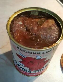 Открытая банка тушенки