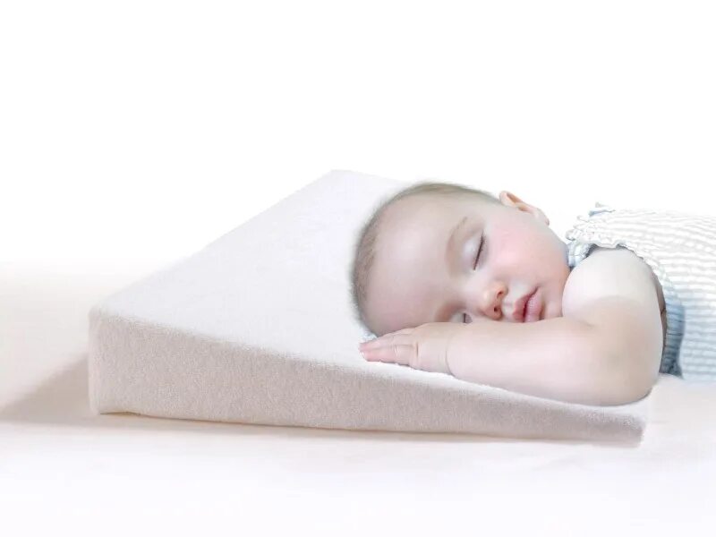 Какие подушки в год ребенку. Подушка ортопедическая комфорт детская для сна ( для младенцев ) к800. Экотен подушка ортопедическая для новорожденных. Подушка Womar. Подушка клиновидная Орматек ортопедическая.