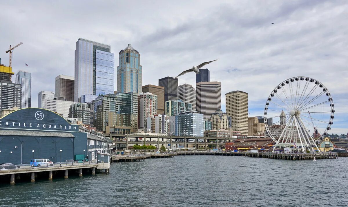 Какой город всемирно известен. Сиэтл город в США. Сиэтл башня. Сиэтл агломерация население. Сиэтл достопримечательности.