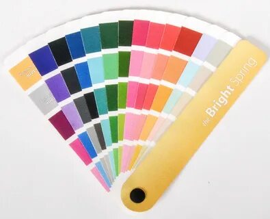 there is a color swatch with different colors on the paper and it has a yel...