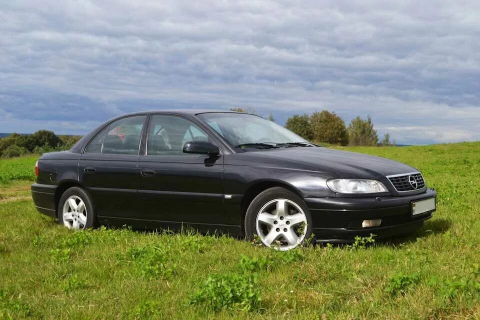 Опель омега б бензин купить. Opel Omega a 2.6. Opel Omega v6. Опель Омега б 2.0. Opel Omega b 2004.