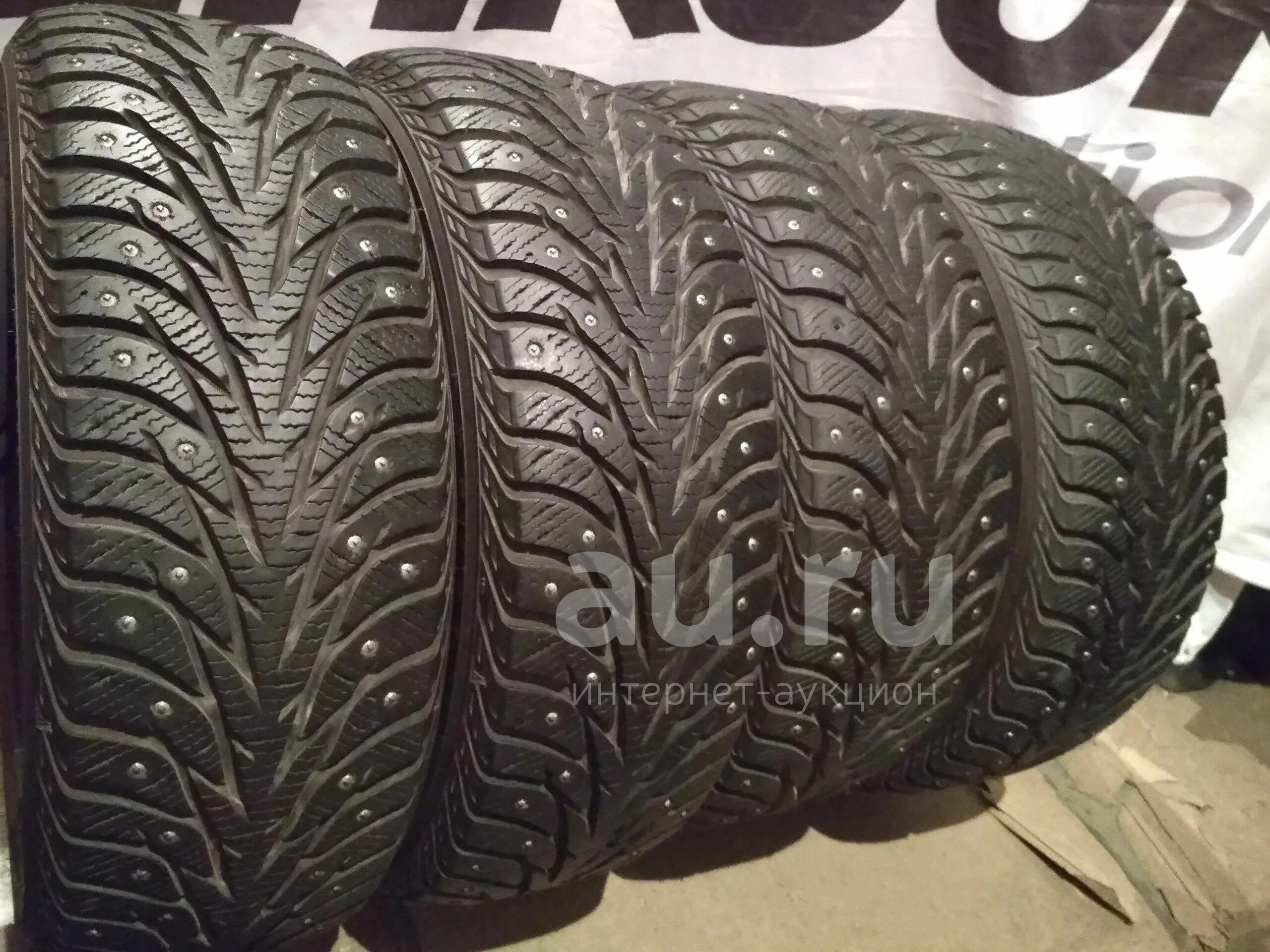 Шины йокогама айс. Yokohama Ice Guard ig35 185/55 r15. Yokohama Ice Guard stud 205 70 15 35. 185 65 14 Йокогама айс гуард. Yokohama ig35 шип 100t.