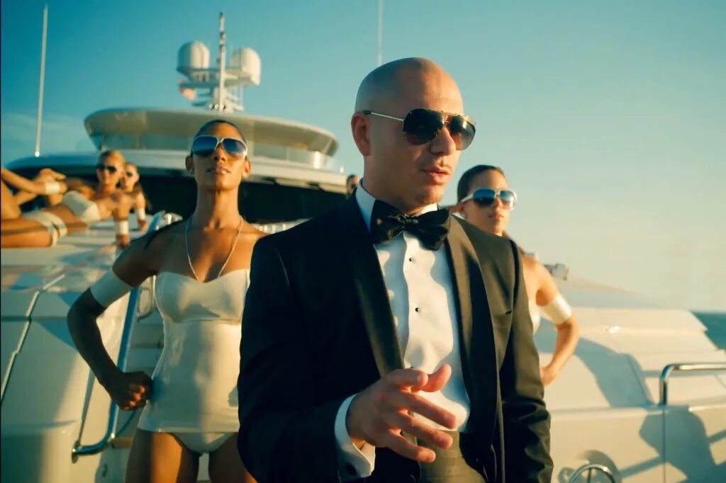 видеоклипы группы питбуль. певец pitbull неон. питбуль клипы. питбуль певец 2007. питбуль певец клипы.