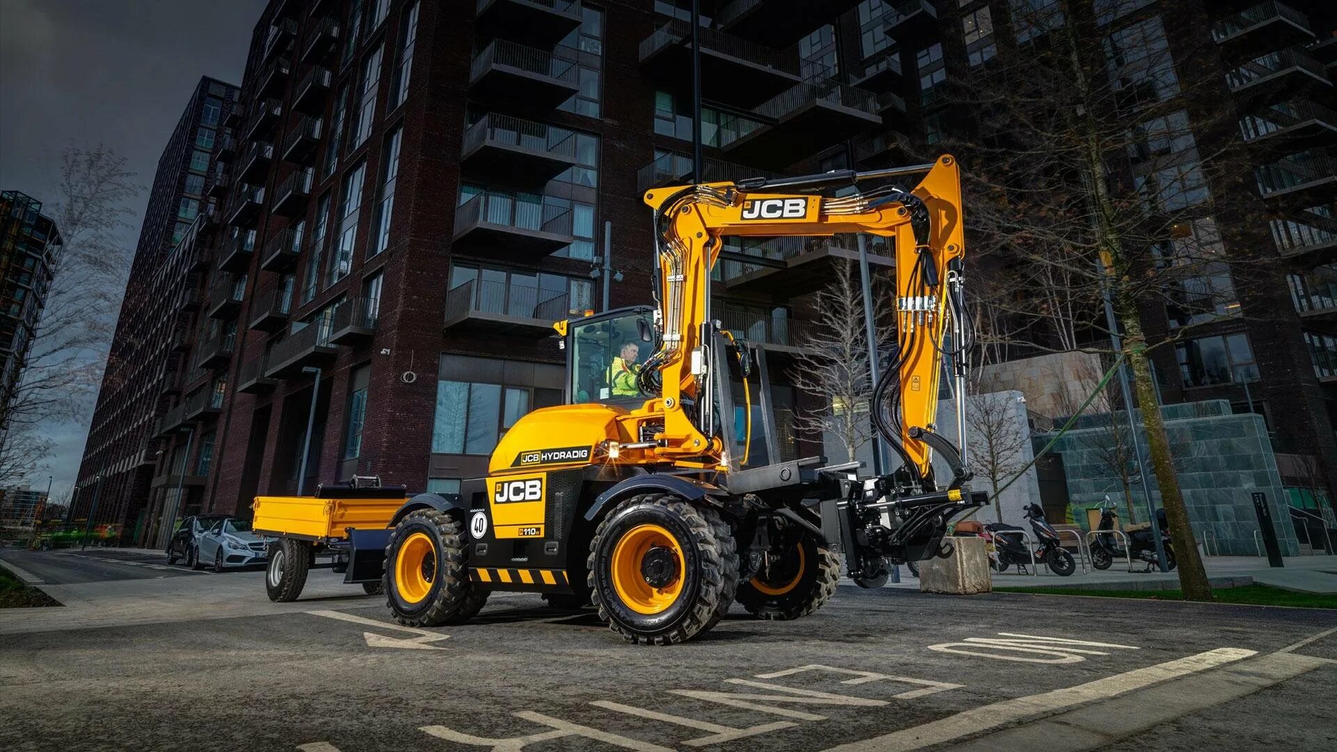 Jcb работа экскаватор. Спецтехника погрузчик JCB. JCB Hydradig. Экскаватор JCB 2023. Новый колесный экскаватор JCB Hydradig.