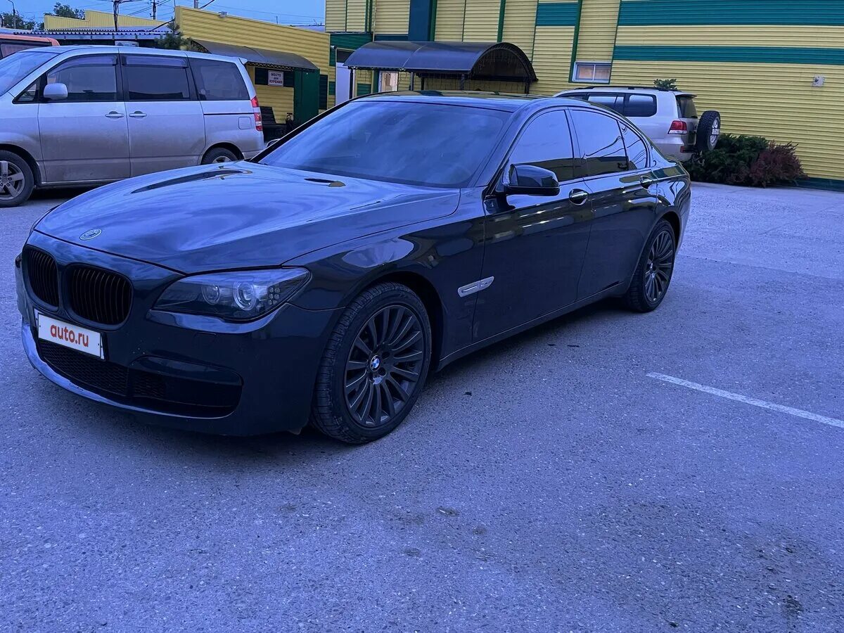 Bmw 750li f02. Бмв м760 li. Bmw 750 черный. Бмв 740 2011 года. Bmw 750 2011.