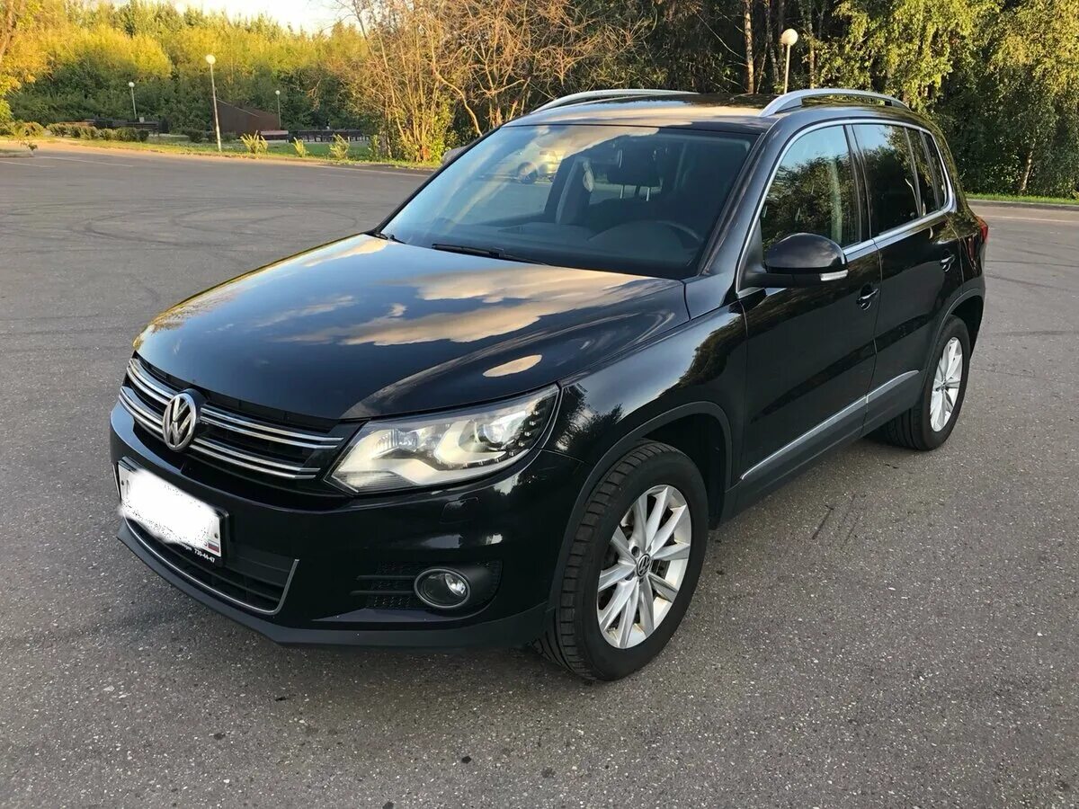 Volkswagen tiguan 2.0 at. Фольксваген Тигуан 2012 черный. Volkswagen Tiguan черный. Tiguan 1 чёрный. Volkswagen Tiguan черный 2013.