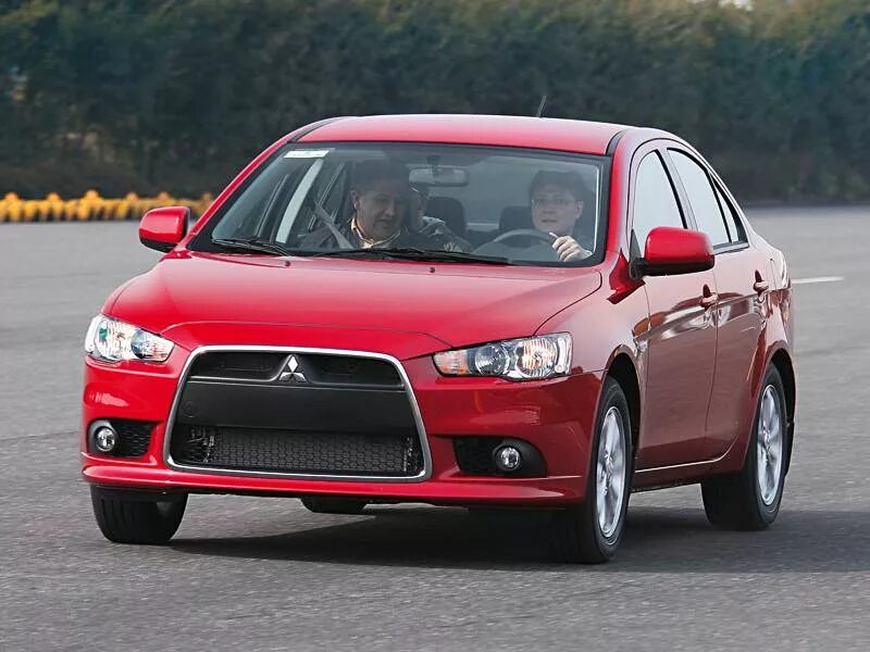 Mitsubishi lancer 10 поколения. Митсубиси Лансер 10 поколения. Митсубиси Лансер 2011. Лансер 10 1 поколение. Mitsubishi Lancer 10 2011.