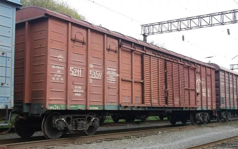 Собственных вагонах. Жд контейнер. Контейнерный поезд. Грузовой вагон. Вагона фосагро хоппер.