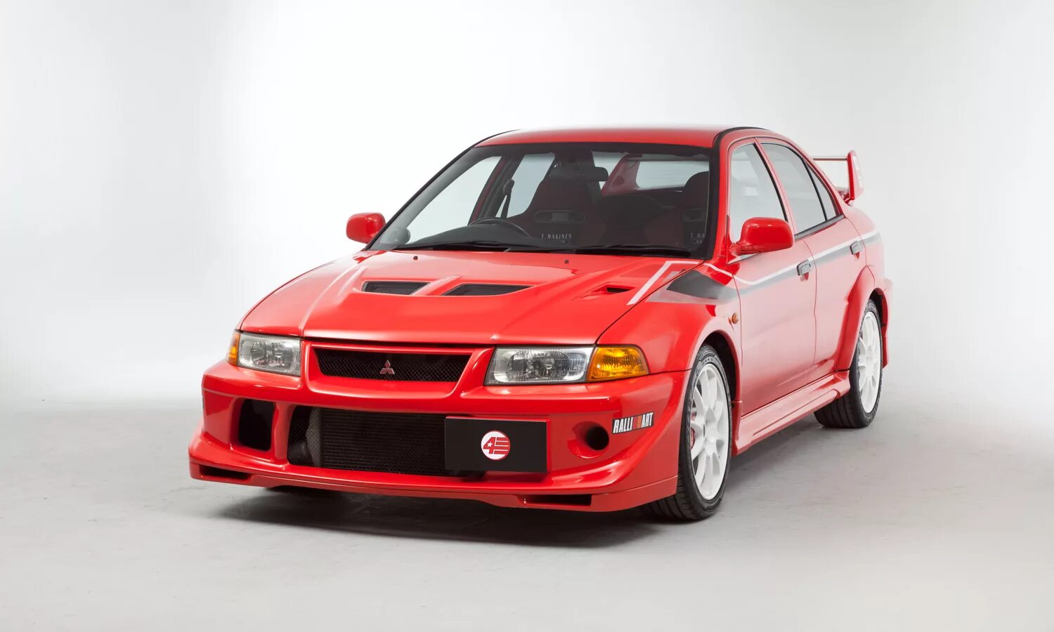 Митсубиси 2000 купить. Mitsubishi Lancer EVO 2000. Mitsubishi EVO 6 2000. Митсубиси Лансер Эво 6. Lancer Mitsubishi Lancer 2000.