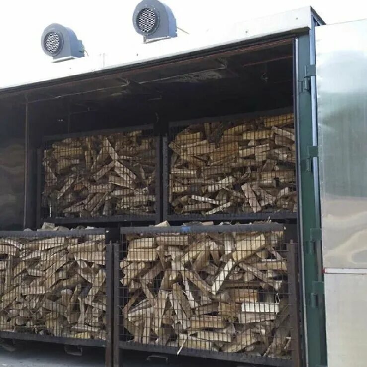 сушка березовых дров. сушка березовых дров. дрова камерной сушки в сетках. березовые дрова. дрова на поддонах.