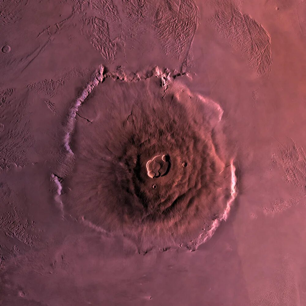 Самый большой вулкан солнечной системы находится. Гора Олимп на Марсе. Олимпус Монс на Марсе. Марсианский потухший вулкан гора Олимп. Марсианский вулкан «Олимп» (Olympus Mons).