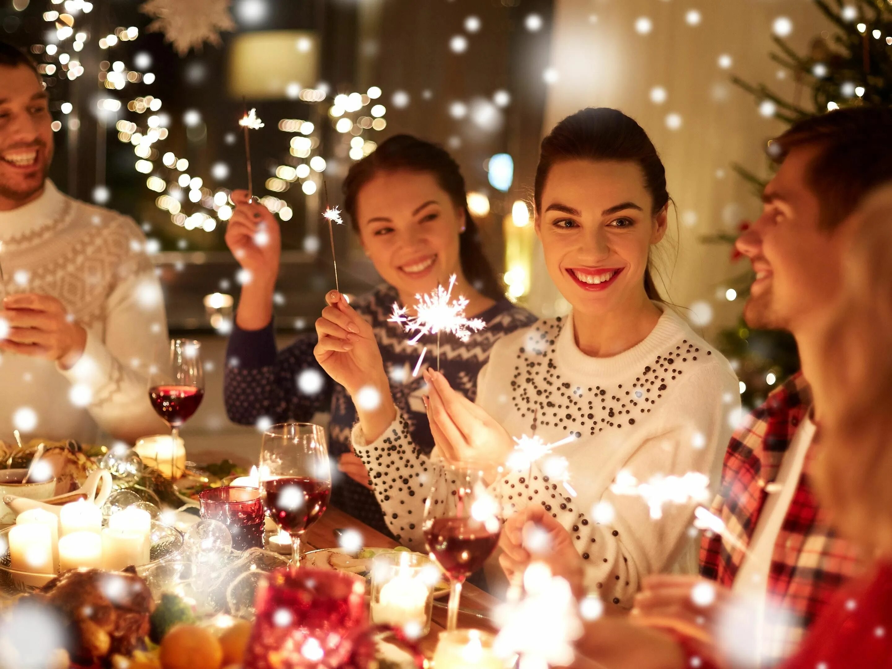 We celebrate new year. Новый год (праздник). Новый год семья. Новогодний человек. Люди за столом новый год.