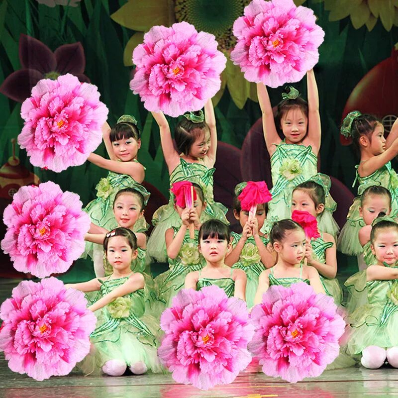 Цветочные танцы где. Костюм цветка. Цветы для танца в детском саду. Танец цветов в детском саду. Цветы на резинке для танца.