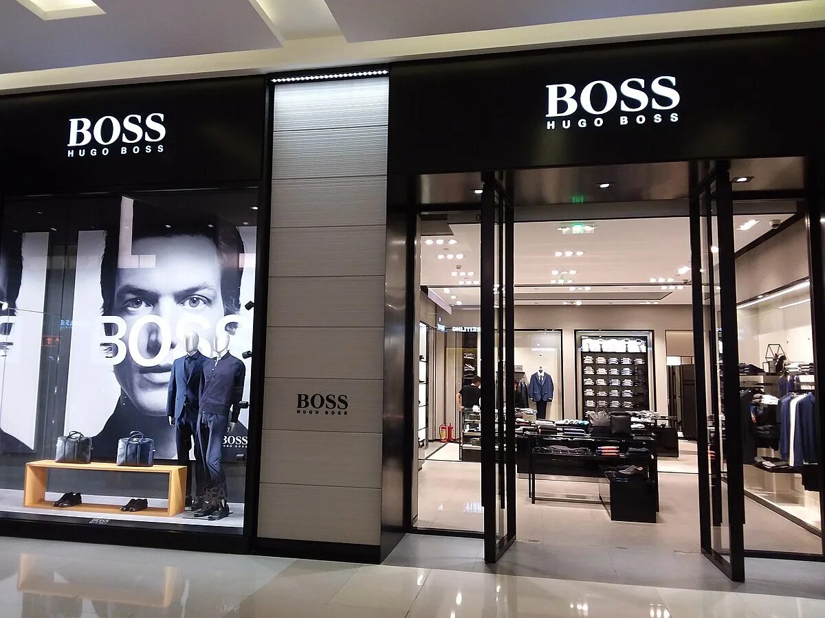 Boss Hugo Boss одежда. Hugo Boss AG одежда. Хьюго босс магазины. Дом Хьюго босс. Магазин хуго босс