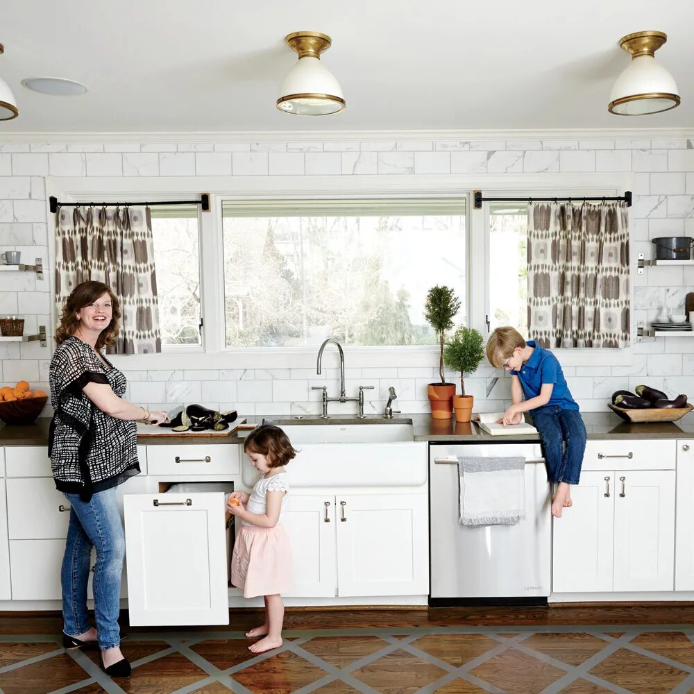 Standing in the kitchen
