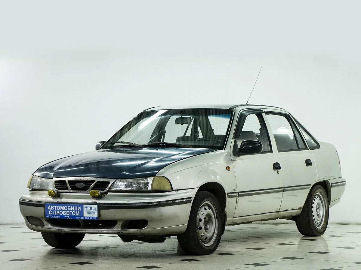 дэу нексия 2011 бежевая. дэу нексия сиреневая. нексия 2011 года рестайлинг голубая. автосалон нексия 1. Daewoo nexia в автосалоне.