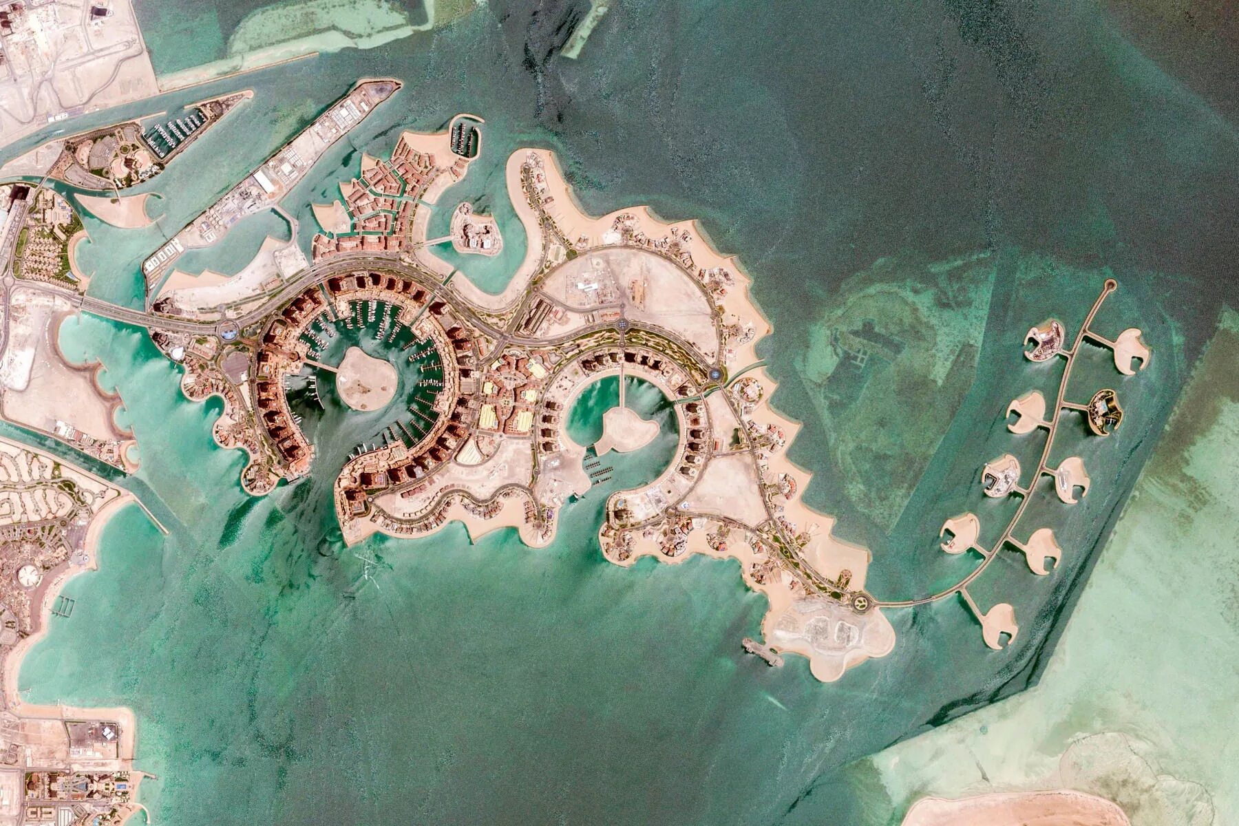 Жемчужина катара - искусственный остров (доха). Земля отвоеванная у моря. Польдеры и дамбы в нидерландах. Какая страна отвоевала землю у моря. Утёсы мохер ирландия.